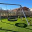Kaksi hopeista keinuistuinta Double silver swing (BNS90) leikkikentällä.