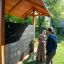 Picnic Shelter w/ Blackboard ulkokäyttöön leikkin alueen katoksella ja liitutaululla.